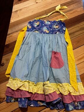 Whimsical Polka Dot Ruffle Apron with Character Print